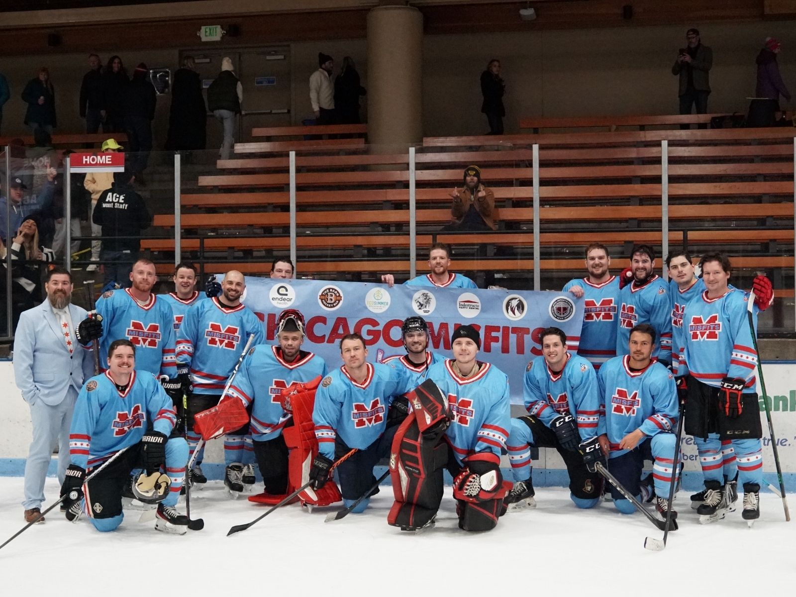 Chicago Misfits team photo on home ice with the club banner